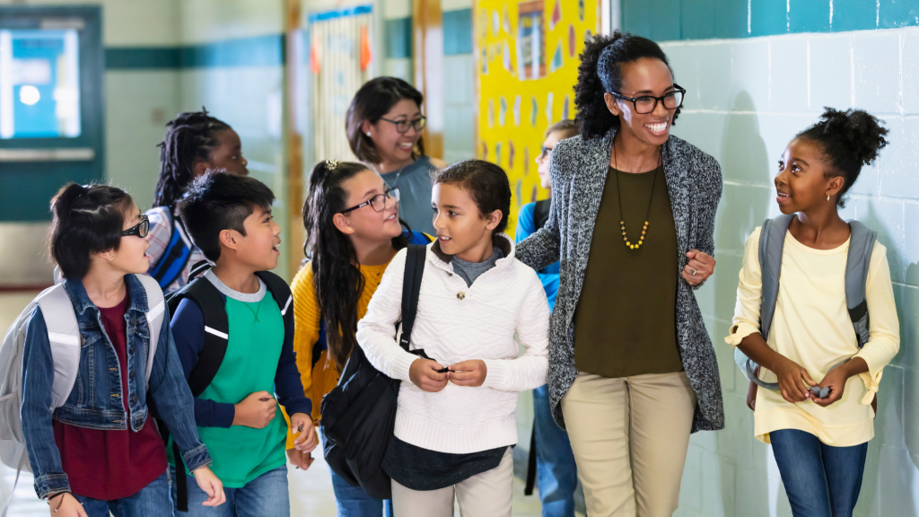 School principal with students