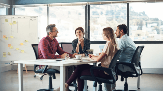 Colleagues working on a strategic vision