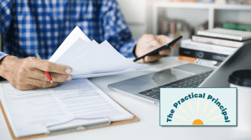 Person multitasking on a computer and whole