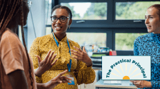 A teacher working with students