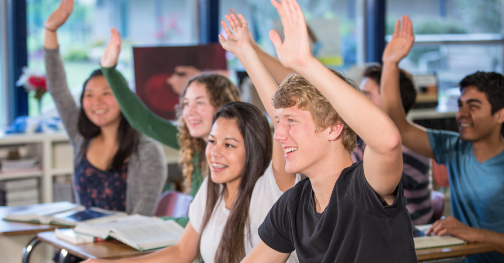 Happy students in class