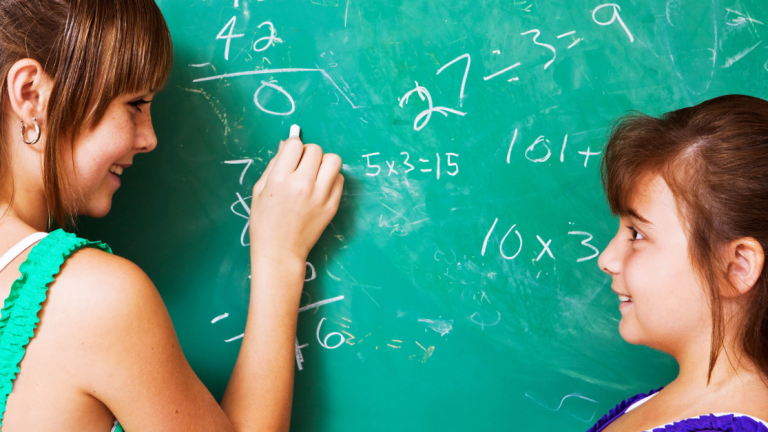 two students working on math