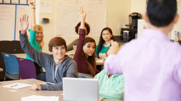 engaged students raising hands