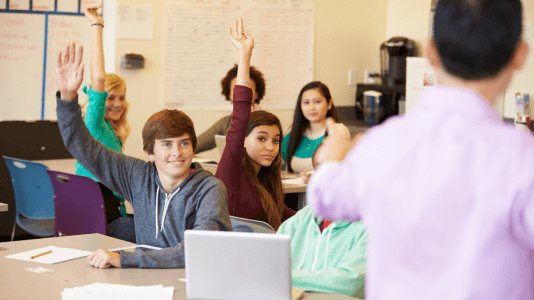 engaged students raising hands