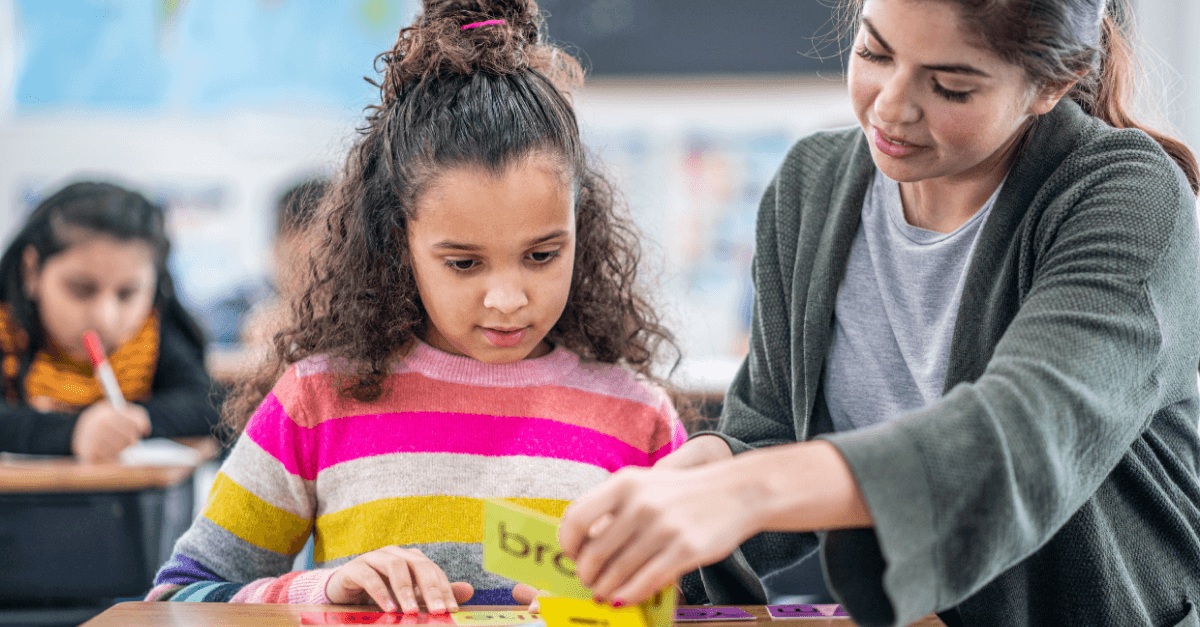 emergent bilingual student and paraprofessional